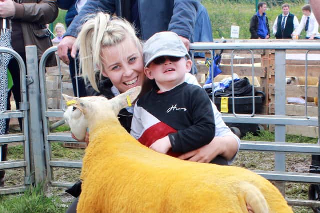 Joint first in the pre-school Young Handlers class is Archie Latimer from Bessbrook pictured with his mother, Sinead.