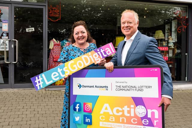 L-R Lesley Johnston (Funding Officer The National Lottery Community Fund) and Dougie King (Head of Fundraising and Communications Action Cancer) pictured outside the Action Cancer Something Different Shop on the Lisburn Road Belfast to mark Action Cancer’s successful bid to the Dormant Accounts Fund NI (delivered by The National Lottery Community Fund with the Department of Finance). Action Cancer has been awarded £93,234 to deliver the ‘Let’s Go Digital Project’ which seeks to bring digital transformation to the whole organisation over the next year, positively impacting upon the charity’s services, fundraising and retail departments.