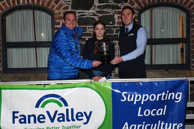YFCU President Peter Alexander, with  Kerry Hayes, Spa YFC who placed 1st in the Beef Stock Judging 14-16 age category, along with Matthew Armstrong, Fane Valley Feeds.