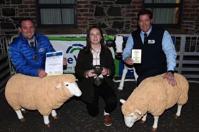 YFCU President Peter Alexander, with Ruby Doherty, Garvagh YFC who placed 1st in the Beef Stock Judging 12-14 age category, along with Thomas Barnet, Fane Valley Stores