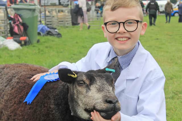 Alistair Macauley, Nutt's Corner, with his second prize Blue Texel gimmer at the Randox Antrim Show. Picture: Julie Hazelton
