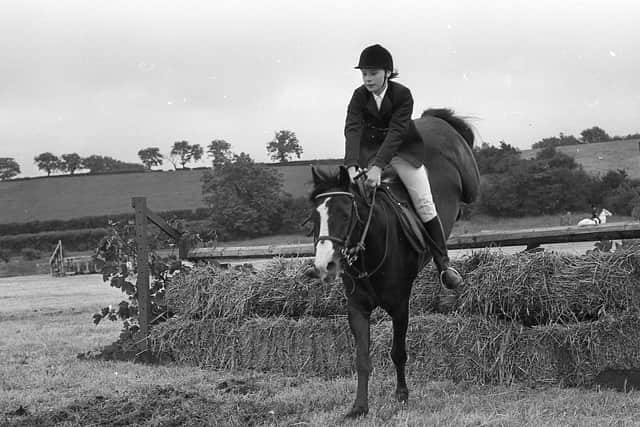 Samantha Prentice clears this jump on her pony Small Order in the 128cm (A, B, C) class at the Saintfield Show in June 1982. Picture: Farming Life/News Letter archives
