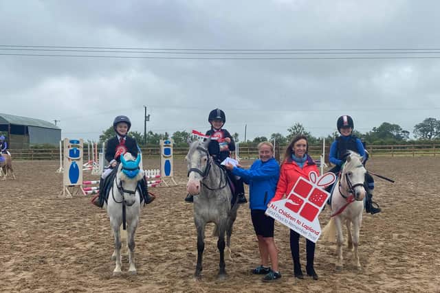 40cm prize winners, left to right, Caleb Mitchell and Pebbles Cara Grant and Lady P Leah Murphy and Dancer pictured with club chairperson Melissa Lemon and Fiona Williamson of NICTLT