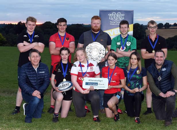 Members of Lisbellaw YFC with the Rosemary Cooper shield after winning the junior title at the YFCU 2022 tag rugby tournament at Dromore Rugby Club, Co Down. The winning team are pictured with Rodney Brown, head of agribusiness, Danske Bank (front left) and Peter Alexander, Young Farmers' Clubs of Ulster's president, (front right)