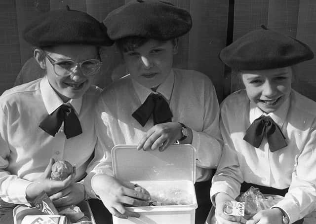 Enjoying their lunch during the Free Presbyterian Church's 40th anniversary celebrations at the King's Hall in March 1991 are Alison Sproule, left, Linda Humphrey and Jennifer Sproule. Picture: News Letter archives