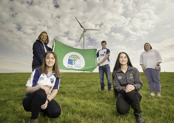 Randalstown Young Farmers’ Club members Elizabeth Adair, Rachel McNeilly and Jack Johnston celebrate their Eco-Club Green Flag Award with Charlene McKeown from Keep NI Beautiful and Orlagh McNeill, from Ulster Wildlife