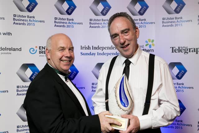 Ian Murphy of Invest NI presents Denis Lynn with the Food and Drink Award at the Ulster Bank Business Achievers Awards in 2015.