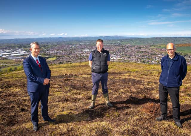 DAERA Minister Edwin Poots MLA has said Community and Voluntary groups across Northern Ireland, including those from the environment sector, have received almost £4million in support from DAERA during the Covid-19 pandemic. Pictured on Cave Hill, overlooking Belfast, are (from left-right); Minister Edwin Poots MLA, Gregor Fulton (Woodland Trust) and Dr Jim Bradley (Belfast Hills Partnership).