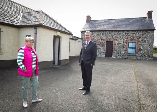 Rural Affairs Minister Edwin Poots pictured with Edith Richardson, St Colman's Parish Community Group as she shows the Minister around the parish hall in Ardboe outside Cookstown.