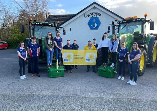 Seskinore YFC committee members pictured with James Anderson, Marie Curie Cancer Care in the run up to Seskinore YFC’s charity tractor run on Sunday 30 May 2021