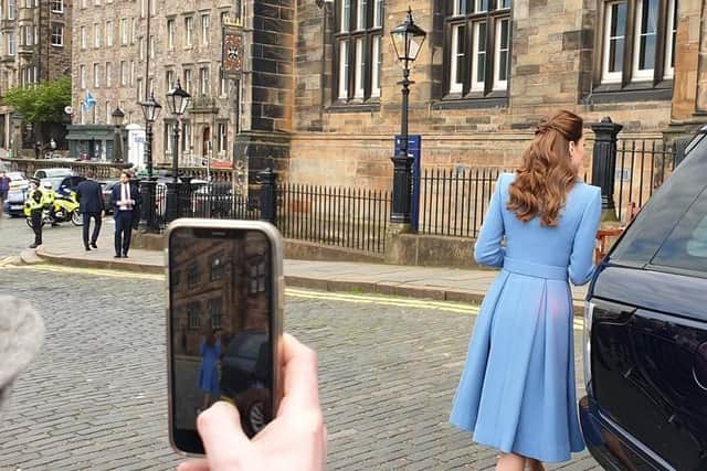 Taking a photo of the Duchess of Cambridge.