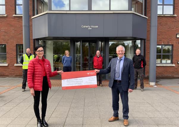 Moore Concrete managing director Wilbert Moore presents a cheque for £1448.80 to Kerry Anderson; Head of Fundraising at Air Ambulance
Northern Ireland