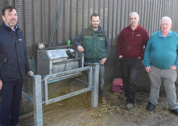 Easyfix's Enda Corrigan chatting to Ronan, Sean and Malachy
Connolly, from Loughgiel in Co Antrim, about the benefits of the new
Easyfix slurry aeration system