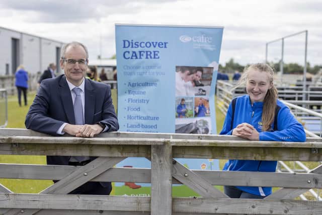 From left to right, Martin McKendry, CAFRE college director congratulates Molly Bradley on her achievements in ABP’s Angus Youth Challenge’ Awards Ceremony at Balmoral Park