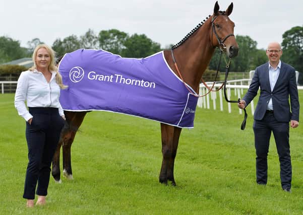 Pictured (l-r) are Emma Meehan, Chief Executive of Down Royal Racecourse and Richard Gillen, Managing Partner at Grant Thornton Northern Ireland alongside 4 year old Ballyhigh owned by Wilson Dennison.