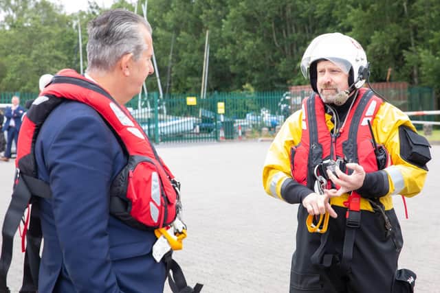 DAERA minister Edwin Poots pictured with Manus Lappin - Lough Neagh Rescue