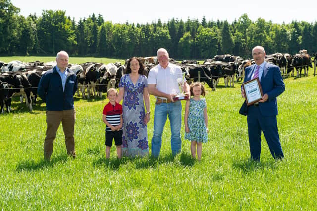 SUPREME MILK QUALITY CHAMPIONS - Eugene and Deirdre Fitzpatrick, with children Ruth and Conor, Lisryan, Granard, Co. Longford, Supreme Champions of the Lakeland Dairies Milk Quality Awards (ROI), for the exceptionally high quality of milk they have produced on their farm throughout the past year. They were presented with the award on their farm by Lakeland Dairies' Chairman, Niall Matthews (left) and Group CEO Michael Hanley.