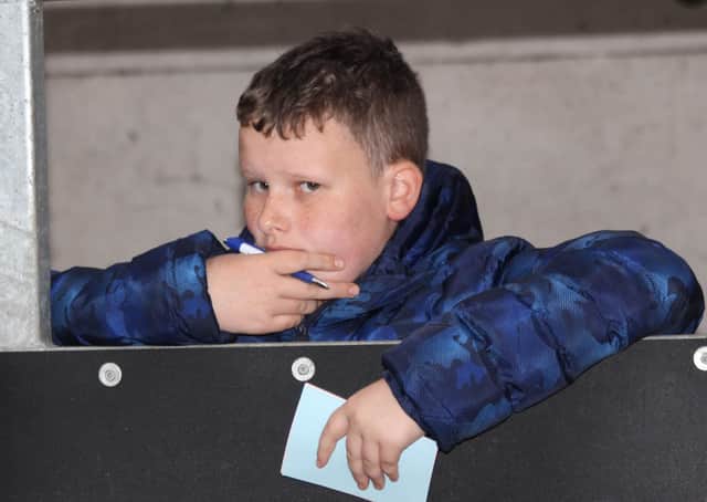 William Charles, Cookstown, deep in concentration at the Holstein Young Breedersâ€TM Club stockjudging event, hosted by the Dunbanard Herd, Bangor.