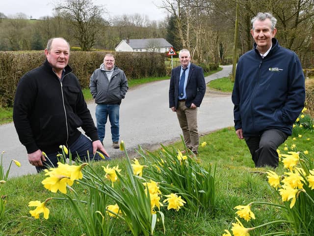 DAERA Minister Edwin Poots MLA is pictured visiting one of the impacted farms in March this year, left to right, farm owner Drew Fleming, Declan McAleer MLA and president of the Ulster Farmers' Union Victor Chestnutt