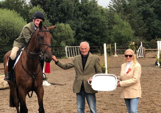 From left, Working Hunter Derby winner, Michael McGaffin on ‘Green Hall Rock N Roll’, David McClurg and Joan Cunningham (show director) presenting the Barbra Andrew’s Memorial Tray