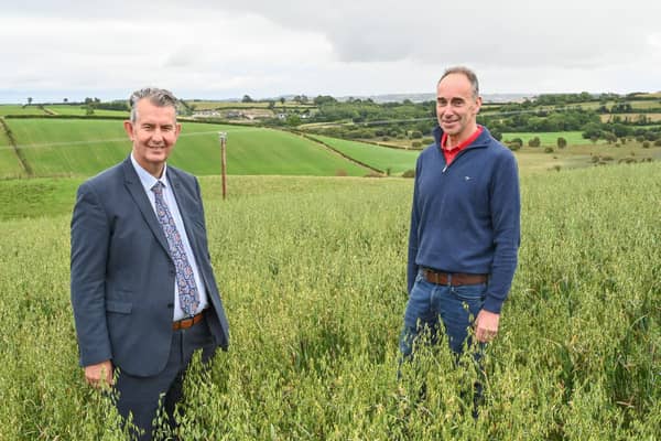 DAERA Minister Edwin Poots visits Cecil Nelson's farm outside Downpatrick to see how Environmental Farming Scheme funding helps with biodiversity.  Pictured L-R Minister Poots and farmer Cecil Nelson