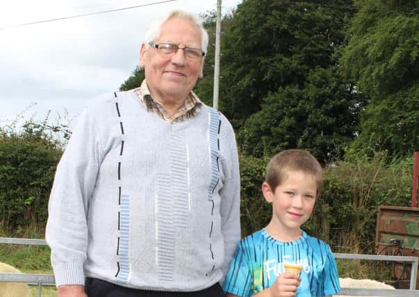 David Kennedy and grandson Andrew enjoying an ice cream at the U.R.B.A. Border Leicester Show on Saturday 14th August