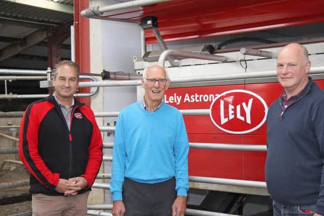 Bryan and Mark Watton, Watton Farms, Ballybogey, were the first dairy farmers in Ireland to install Lely A2 milking robots. After 21 years the original machines have been replaced by three new A5 models. Bryan and Mark are pictured with Jim Irwin, Lely Center Eglish. Picture: Julie Hazelton
