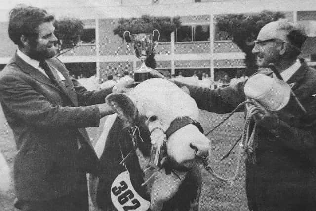 1974: Simmental classes were introduced at Balmoral Show in 1974. NI Simmental Club chairman Billy Robson presented the Irwin Cup for the supreme champion, Irish Commander, to the late Robert McBride from Crossgar. Mr McBride was one of the first breeders to import Simmental cattle into Northern Ireland.