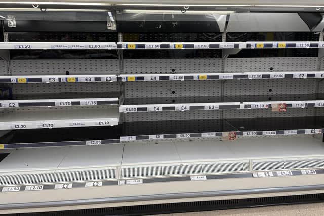 Empty shelves in the meat aisle of a branch of Tesco in Liverpool on Tuesday September 21. Shoppers will start noticing shortages within days as a result of the crisis in carbon dioxide (CO2) supply, a food industry chief has warned. Photo:  Peter Byrne/PA Wire