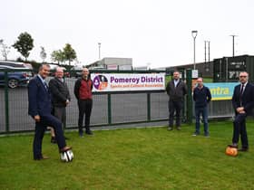 DAERA Minister Edwin Poots MLA is pictured with Mid Ulster Council Chair Councillor Paul McLean, Chairperson of the Pomeroy District Sports and Cultural Association Keith Buchanan MLA and members of the association at the new facilities at the pitch in Pomeroy, County Tyrone.