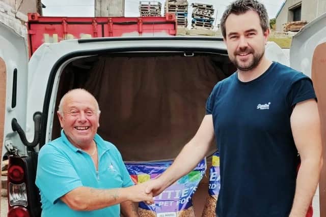 Tommy McClean receiving his bags of BEATTIE's Bird & Pet Foods Sponsored Corn for Finishing 1st Open and winning the I.N.F.C. Lamballe 2021. Well done Tommy, keep up the good work. Tommy McClean (l) & Jeffrey Beattie.
