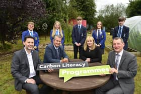 Pupils from Antrim Grammar School and St Benedict’s College, Randalstown, helped launch a new DAERA-funded Carbon Literacy project to help in the fight against climate change. (L-R) Scott Howes, Keep Northern Ireland Beautiful, Environment Minister Edwin Poots, Education Minister Michelle McIlveen and Ian Humphrey, Chief Executive of Keep Northern Ireland Beautiful.