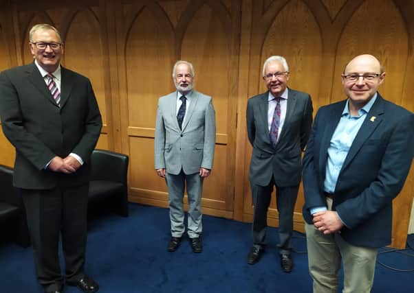 Pictured at the General Assembly of the Presbyterian Church in Ireland, which is taking place in Belfast are (left to right) the Convener of the Council for Mission in Ireland Very Rev Dr Frank Sellar, Acting Council Secretary, Rev Jim Stothers and PCI's Chaplaincy Secretary, Rev Robert Bell, with PCI's new rural chaplain Rev Kenny Hanna.