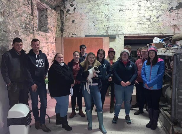 Some of the members from Newtownards YFC with Jessica Lee, YFCU farm safety mentor, at Jay Wardens farm at the Farm Safety meeting last week
