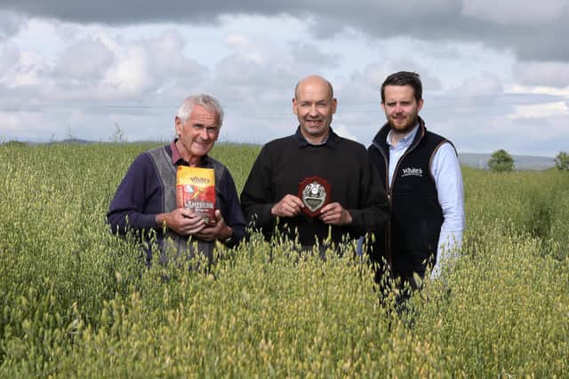 Left to right:  John Anderson, Alan Anderson, White’s NI Grower of the year and Steven McAllister, White’s agri supply chain pictured at the Anderson farm in Coleraine. Alan has been awarded the John Finnan Oat Quality Award by White’s Oats for his commitment to Oat research and trials and his innovative approach to producing sustainable, high quality porridge oats.