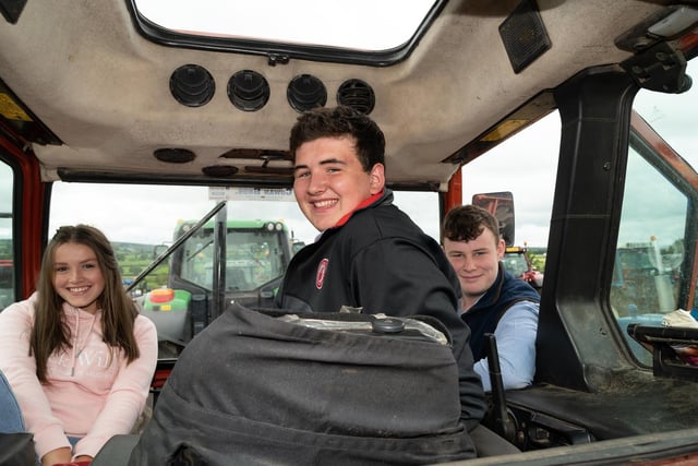 Amy Quigle, Arron Ruddy and Caolin Kearns  at the Elaine McGlinchey Memorial Tractor Run in Castlefinn on Sunday last which after a great day raised 12,500 Euro for Donaghmore NS. Photo Clive Wasson