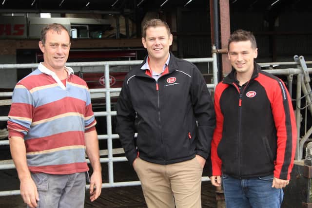 Finalising plans for next weekâ€TMs Lely Open Day are, from left: host farmer John Killen, Campsie, with Dean Cashel and Jacob Irwin, Lely Center Eglish. Picture: Julie Hazelton