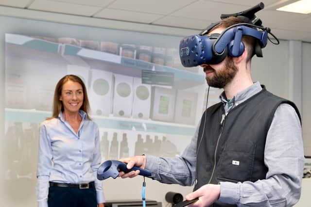 Dr Amy Burns, Director of the Food and Consumer Testing Suite (FACTS) at Ulster University is pictured with Jonny Agnew, General Manager, Henderson Kitchen at the new Consumer Insights Lab at the UU Coleraine Campus. The virtual reality store is based on a real-life Henderson Group SPAR store in Northern Ireland to enable the company to gain even further data on how and why shoppers make their choices in a store environment.