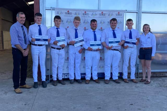 Members of the stockjudging team who were placed 2nd overall team, are presented certificates by Holstein UK President John Jameson and Lizzie Bradley, Semex - sponsor