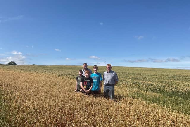 Paul and Mark Russell are pictured in their prize-winning field along with
Mark’s sons (left to right) Lee, Ryan and Aaron.