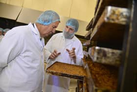 Minister Poots is pictured during a visit to Graham’s Bakery in Dromore with Timothy Graham.