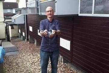A very delighted Jimmy Burrows outside his lofts with his 1st Open NIPA winner from Fermoy 14.203 Birds. Jimmy's winner a Gabby Vandenabelle cheq cock bred at Harmony Lofts Stud