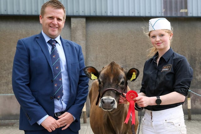 Judge Sam Wake presents first prize in the intermediate Jersey showmanship class to Amy McNeely from Bready, Strabane. Picture: Jane Steel