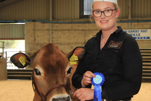 Chloe McNeely exhibited the second placed Jersey heifer Clydevalley VIP Flora 2 at the 19th multi-breed dairy calf show. held at Dungannon. PIcture: Julie Hazelton