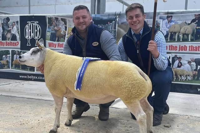 Reserve overall champion and top priced female of 1,900gns was awarded to Gary Beacom who is pictured with judge Ross Campbell