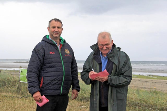 NI Aberdeen Angus Club vice-chairman Ian Browne, pictured at the open day with stockjudging competition master judge John Blackburn, Clogher. Picture: Julie Hazelton