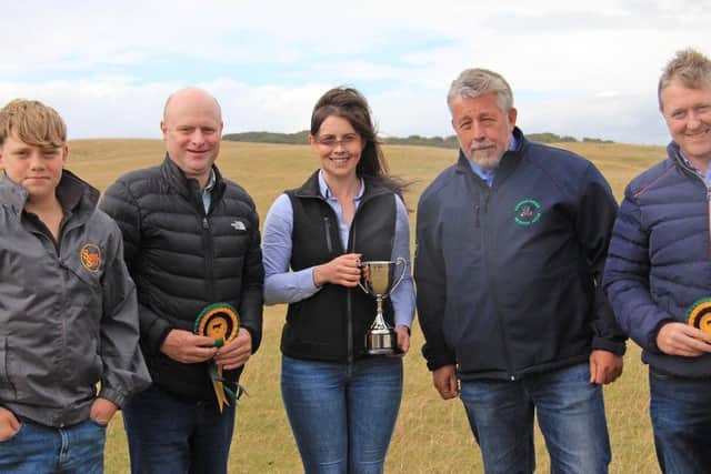 Best newcomers in the NI Aberdeen Angus Club's Herd Competition included: Mena McCloskey, Ard Dubh Herd, Dungiven, first; Graham Donaghy, Lisnavaragh Herd, Scarva, second; Noel and Daniel Willis, Greenacres Herd, Portadown, third. Adding his congratulations is judge Ian Watson, Roxburghshire. Picture: Julie Hazelton