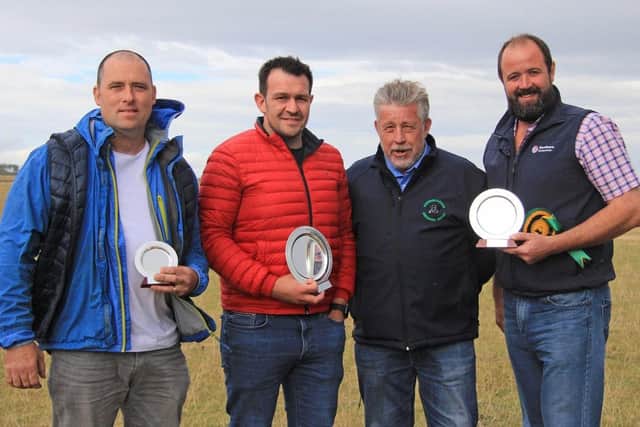 Scottish judge Ian Watson pictured with the NI Aberdeen Angus Club's large herd prize winners, Peter Lamb, Richhill Herd, first; Stephen Wallace, Baronagh Herd, Garvagh, second; and Mark Clements, Clementhill Herd, Ballyronan, third. Picture: Julie Hazelton