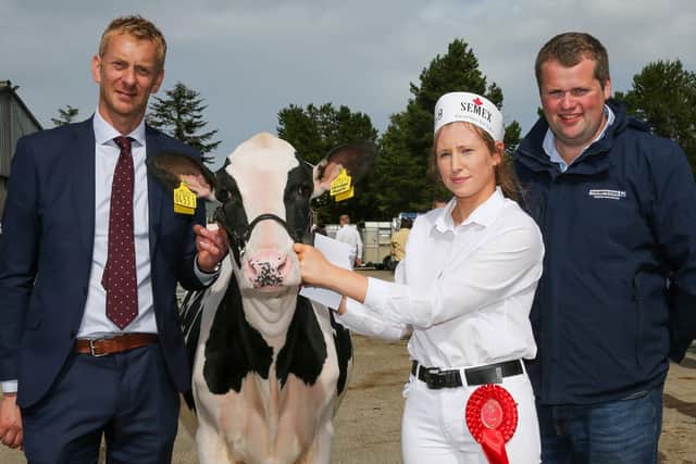 Winner of class 11, Hilltara Lambda Apple, exhibited by Jason Booth and shown by Sarah Williamson. Pictured with David Hodgson, judge and Phil Donaldson, sponsor