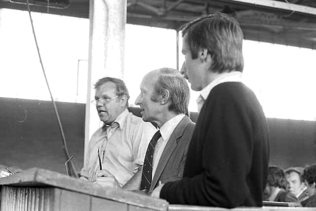 Auctioneer Arthur Robinson pictured in action at the Suffolk breed show and sale at Balmoral in August 1982. Club secretary, David Crossan, centre, looks on. Picture: Farming Life/News Letter archives
